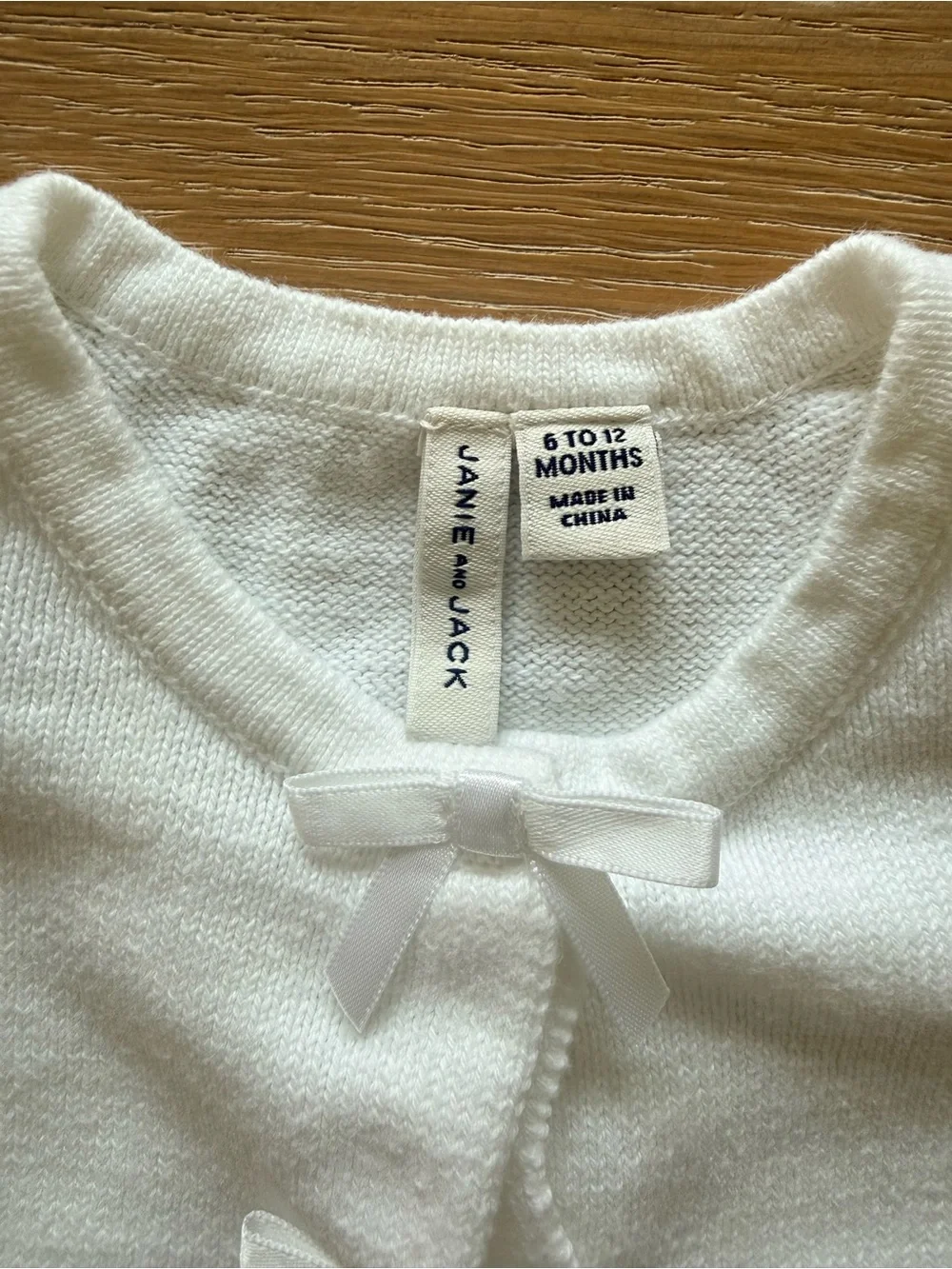 Janie and Jack - Classic White Baby Cardigan with Front Bow Detail - Size 6-12 M